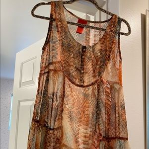 Sleeveless shear top